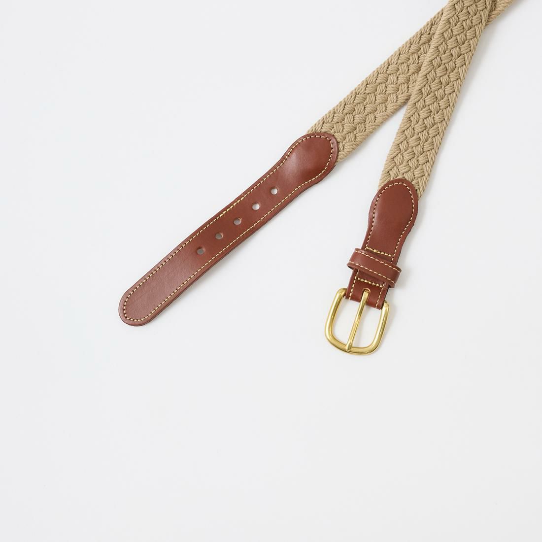 コットンキャンバスを使用した編み込み模様が特徴的なベルト